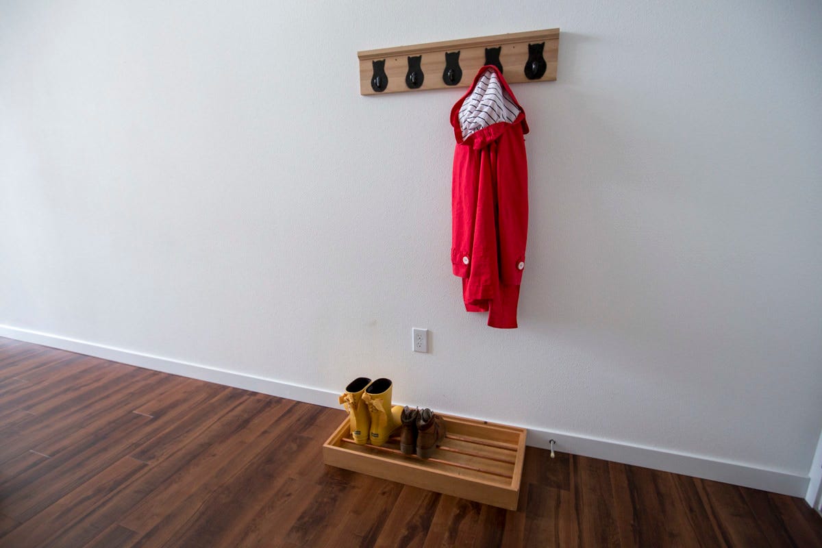 diy entryway coat rack and copper pipe boot tray