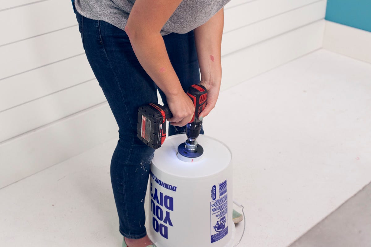 drilling hole in bucket for flapper