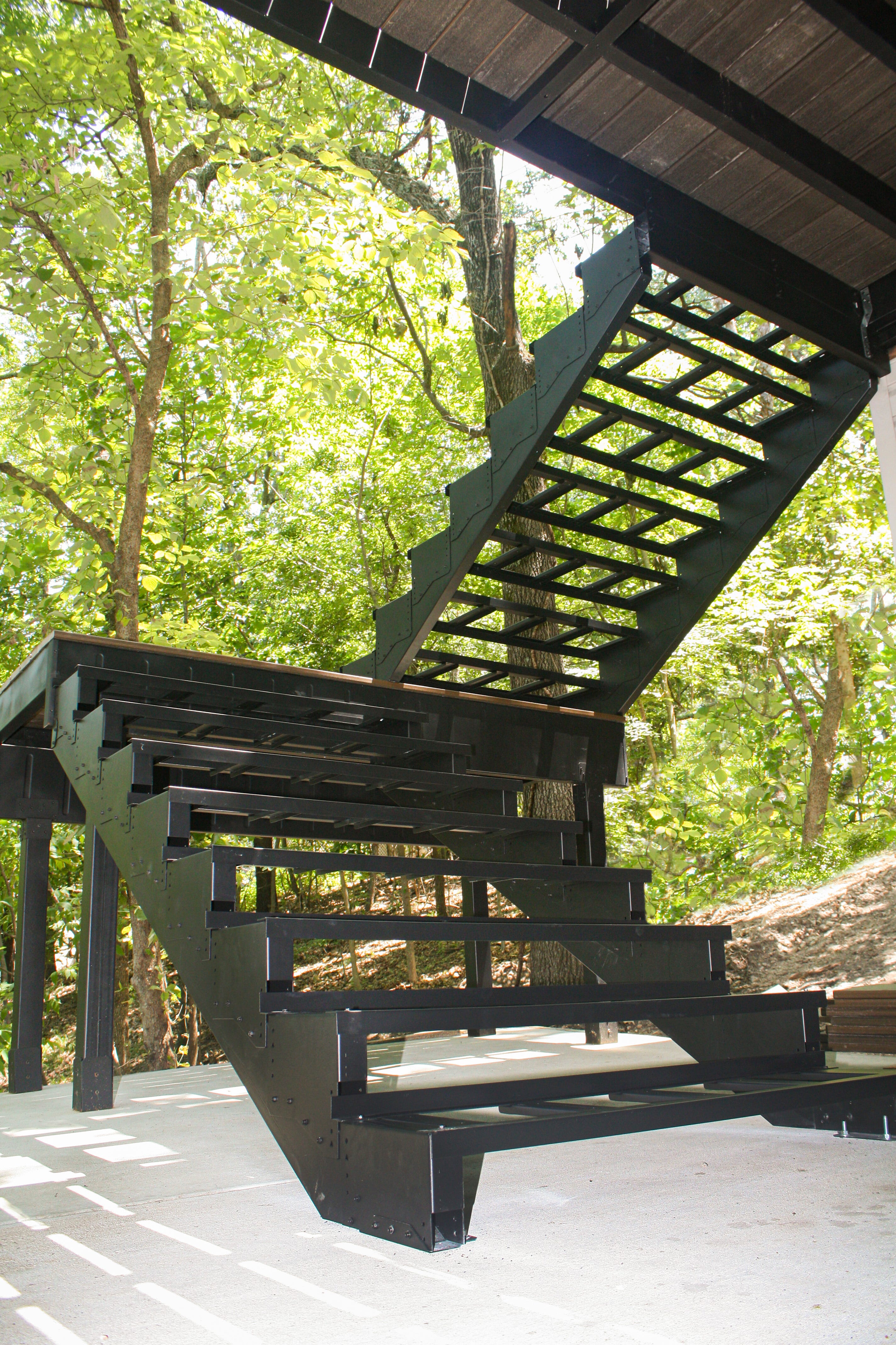 Steel deck stair framing on an in-progress deck.