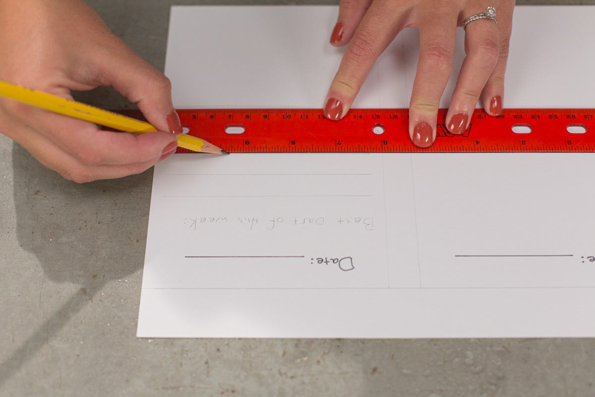 Writing and drawing lines on paper.