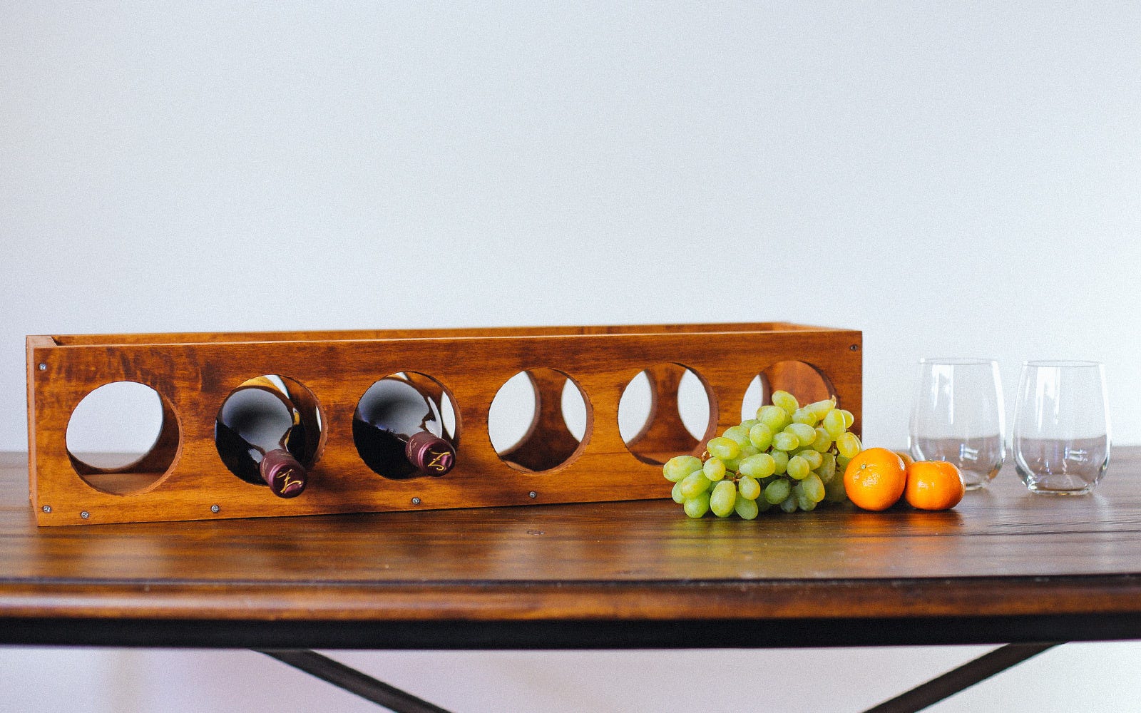 DIY wooden wine rack stained with Varathane Summer Oak.